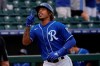 FILE - In this Thursday, March 25, 2021 file photo, Kansas City Royals' Adalberto Mondesi gestures as he runs to home plate after hitting a home run in the first inning of a spring training baseball game in Surprise, Ariz. Kansas City Royals shortstop Adalberto Mondesi has been reinstated from the 10-day injured list after missing the first 45 games this season with a right oblique sprain, Tuesday, May 25, 2021. (AP Photo/Sue Ogrocki, File)
