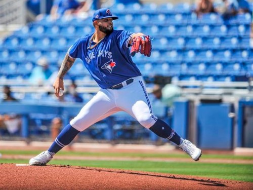 FILE - In this March 14, 2021, file photo, Toronto Blue Jays pitcher Alek Manoah throws to a New York Yankees batter during the first inning of a spring training baseball game in Dunedin, Fla. Manoah, a 23-year-old prospect, is being called up by the Blue Jays to make his major league debut against the New York Yankees on Wednesday night, May 26. (Steve Nesius/The Canadian Press via AP, File)