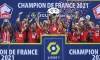 Lille players pose with the trophy in Camphin en Pevele, northern France, Monday May 24, 2021, to celebrate winning the French League One Soccer. Lille won 2-1 at Angers to secure its first French league title in 10 years and beat defending champion Paris Saint-Germain by one point. Victory gave Lille a fourth French crown and stopped PSG from sealing a record-equaling 10th to join Marseille and Saint-Etienne. (AP Photo)