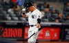 New York Yankees left fielder Brett Gardner (11) goes to the dugout after striking out against the Toronto Blue Jays during the fifth inning of a baseball game Tuesday, May 25, 2021, in New York. (AP Photo/Noah K. Murray)