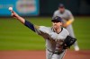 FILE - In this Friday, Sept. 25, 2020 file photo, Milwaukee Brewers starting pitcher Josh Lindblom throws during the first inning in the second game of a baseball doubleheader against the St. Louis Cardinals in St. Louis. The Milwaukee Brewers have designated for assignment veteran right-hander Josh Lindblom. Milwaukee designated Lindblom while recalling left-hander Eric Lauer from its Triple-A Nashville affiliate to start Wednesday night May 26, 2021 against the San Diego Padres.(AP Photo/Jeff Roberson, File)