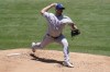 Texas Rangers starting pitcher Dane Dunning (33) throws during the first inning of a baseball game against the Los Angeles Angels Wednesday, May 26, 2021, in Anaheim, Calif. (AP Photo/Ashley Landis)