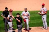 Third base umpire Joe West, center, tosses St. Louis Cardinals manager Mike Shildt (8) as home plate umpire Nic Lentz. catcher Andrew Knizner and relief pitcher Giovanny Gallegos watch during the seventh inning of an interleague baseball game against the Chicago White Sox Wednesday, May 26, 2021, in Chicago. (AP Photo/Charles Rex Arbogast)