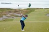 Leopoldo Herrera III hits off of the fifth tee during the final round of the U.S. Amateur Four-Ball golf championship, Wednesday, May 26, 2021, at Chambers Bay in University Place, Wash. (AP Photo/Ted S. Warren)