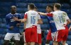 FILE - In this March 18, 2021 file photo, Rangers' Glen Kamara, left argues with Slavia Prague's Ondrej Kudela during a Europa League soccer match. SV Eindhoven defensive midfielder Michal Sadílek became the last player on the Czech Republic squad for the European Championship on Thursday, May 27, 2021 after UEFA upheld a 10-game ban for Slavia Prague defender Ondrej Kúdela for racially abusing Rangers midfielder Glen Kamara. (Andrew Milligan/PA via AP, File)
