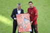 FC Bayern Munich President Herbert Hainer, left, poses with his player Miroslav Klose prior to the start of the Bundesliga soccer match between Bayern Munich and FC Augsburg at the Allianz Arena stadium in Munich, Germany, Saturday, May 22, 2021. (AP Photo/Matthias Schrader, Pool)