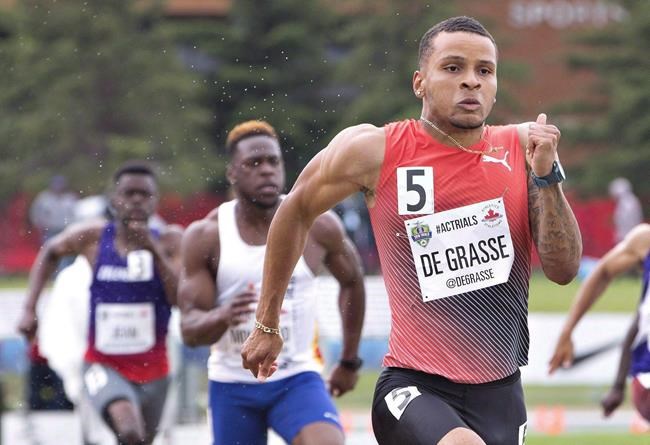 Andre De Grasse leads during the senior men's 200 metre semifinals at the Canadian Track and Field Championships and Selection Trials for the 2016 Summer Olympic and Paralympic Games, in Edmonton, Alta., on Sunday July 10, 2016. THE CANADIAN PRESS/Jason Franson