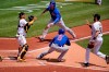 Pittsburgh Pirates first baseman Will Craig, right, tosses the ball to catcher Michael Perez, left, after Chicago Cubs' Javier Baez (9) hit a fielder's choice third to first and was caught in a rundown between home and first during the third inning of a baseball game in Pittsburgh, Thursday, May 27, 2021. Cub's Willson Contreras, top center, scores on the play and Báez reached second on an errant throw by Pirates' catcher Perez. (AP Photo/Gene J. Puskar)