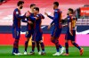 Barcelona's Lionel Messi celebrates with team mates scoring the opening goal during the Spanish La Liga soccer match between FC Barcelona and Celta at the Camp Nou stadium in Barcelona, Spain, Sunday, May. 16, 2021. (AP Photo/Joan Monfort)