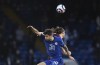 Chelsea's Christian Pulisic, front, duels for the ball with Leicester's Caglar Soyuncu during the English Premier League soccer match between Chelsea and Leicester City at Stamford Bridge Stadium in London, Tuesday, May 18, 2021. (Glyn Kirk/Pool via AP)
