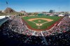FILE - In this March 5, 2019, file photo, fans fill most of the seats at Tempe Diablo Stadium, the Los Angeles Angels' spring stadium ballpark, during the team's spring training baseball game against the Chicago Cubs in Tempe, Ariz. The Angels will keep their spring training home in Tempe until at least 2035, after reaching a deal for an extensive renovation of Tempe Diablo Stadium. (AP Photo/Elaine Thompson, File)