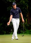 Jordan Spieth coaxes his ball to the No. 7 cup during the second round of the Charles Schwab Challenge golf tournament at Colonial in Fort Worth, Texas, Friday, May 28, 2021. The ball settled at the lip of the cup, and Spieth tapped in for par. (Tom Fox/The Dallas Morning News via AP)