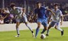 Inter Miami midfielder Victor Ulloa (13) splits the defense of D.C. United forward Adrien Perez, right, and midfielder Kevin Paredes during the first half of an MLS soccer match Saturday, May 29, 2021, in Fort Lauderdale, Fla. (AP Photo/Jim Rassol)