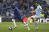 Chelsea's N'Golo Kante, left, challenges for the ball with Manchester City's Ferran Torres during the Champions League final soccer match between Manchester City and Chelsea at the Dragao Stadium in Porto, Portugal, Saturday, May 29, 2021. (Carl Recine/Pool via AP)