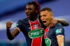 PSG's Kylian Mbappe celebrates with Moise Kean after scoring his side's second goal during the French Cup final soccer match between Paris Saint Germain and Monaco at the Stade de France stadium, in Saint Denis, north of Paris, Wednesday, May 19, 2021. (AP Photo/Christophe Ena)