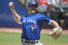 Toronto Blue Jays starting pitcher Ross Stripling delivers against the Cleveland Indians during the first inning of the first baseball game of a doubleheader in Cleveland, Sunday, May 30, 2021. (AP Photo/Phil Long)