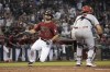 Arizona Diamondbacks' Matt Peacock (47) scores a run in the fourth inning during a baseball game against the St. Louis Cardinals, Sunday, May 30, 2021, in Phoenix. (AP Photo/Rick Scuteri)
