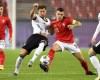 FILE - In this Tuesday, Oct. 13, 2020 filer, Germany's Leon Goretzka, left, Switzerland's Granit Xhaka compete for the ball during the UEFA Nations League soccer match between Germany and Switzerland in Cologne, Germany. (AP Photo/Martin Meissner, File)