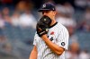 New York Yankees starting pitcher Jameson Taillon reacts while walking to the dugout during the fourth inning of a baseball game against the Tampa Bay Rays on Monday, May 31, 2021, in New York. (AP Photo/Adam Hunger)