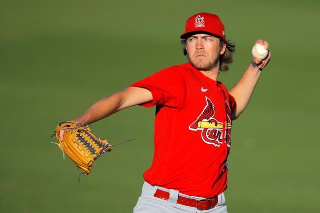 FILE - In this March 5, 2020, file photo, St. Louis Cardinals pitcher Matthew Liberatore works out prior to a spring training baseball game against the Washington Nationals in West Palm Beach, Fla. St. Louis prospect Liberatore pitched one-run ball for five innings and manager Mike Scioscia’s U.S. team defeated Nicaragua, Monday, May 31, 2021, in the first game of its second chance to qualify for the Olympics. (AP Photo/Julio Cortez, File)