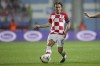 FILE - In this Saturday, Nov. 16, 2019 filer, Croatia's Luka Modric controls the ball during the Euro 2020 group E qualifying soccer match between Croatia and Slovakia in Rijeka, Croatia. (AP Photo/Daniel Kasap, File)