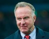 FILE - In this Sept.17, 2013 file photo Bayern Munich CEO Karl-Heinz Rummenigge awaits an interview prior to the Champions League first round group D soccer match between FC Bayern Munich and CSKA Moscow, in Munich, Germany. Bayern Munich chief executive Karl-Heinz Rummenigge is retiring six months earlier than expected to be replaced by former goalkeeping great Oliver Kahn. (AP Photo/Matthias Schrader, file)