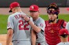 St. Louis Cardinals manager Mike Shildt, center, pats starting pitcher Jack Flaherty (22) on the back as Shildt pulls Flaherty from an interleague baseball game in the fourth inning against the Chicago White Sox Tuesday, May 25, 2021, in Chicago. (AP Photo/Charles Rex Arbogast)