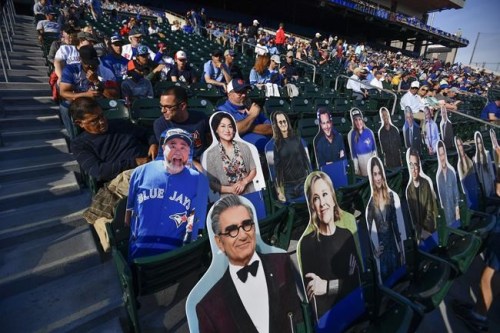 Fans and cardboard cutouts of celebrities fill the stands at Sahlen Field before a baseball game between the Toronto Blue Jays and the Miami Marlins in Buffalo, N.Y., Tuesday, June 1, 2021. (AP Photo/Adrian Kraus)
