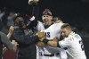 Arizona Diamondbacks' Josh Reddick celebrates with Jon Duplantier and Stephen Vogt (21) after hitting a two-run double against the New York Mets in the 10th inning of a baseball game Tuesday, June 1, 2021, in Phoenix. The Diamondbacks won 6-5. (AP Photo/Rick Scuteri)