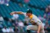 Oakland Athletics starting pitcher Chris Bassitt throws to a Seattle Mariners batter during the first inning of a baseball game Tuesday, June 1, 2021, in Seattle. (AP Photo/Ted S. Warren)