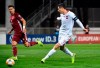 FILE - In this Thursday, Oct. 10, 2019 filer, Poland's Robert Lewandowski scores his first goal during Euro 2020 group G qualifying soccer match between Latvia and Poland in Riga, Latvia. (AP Photo/Roman Koksarov, File)