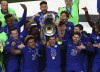 Chelsea players lift the trophy after winning the Champions League final soccer match against Manchester City at the Dragao Stadium in Porto, Portugal, Saturday, May 29, 2021. (Michael Steele/Pool via AP)