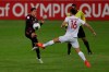 Mexico's Sebastian Cordova, left, and Canada's Callum Montgomery fight for the ball during a Concacaf Men's Olympic qualifying championship semi-final soccer match in Guadalajara, Mexico on March 28, 2021. THE CANADIAN PRESS/AP, Fernando Llano