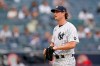 New York Yankees starting pitcher Gerrit Cole (45) reacts heading to the dugout after allowing a two-run home run to Tampa Bay Rays designated hitter Austin Meadows in the fourth inning of a baseball game, Thursday, June 3, 2021, at Yankee Stadium in New York. (AP Photo/Kathy Willens)