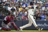 Milwaukee Brewers' Christian Yelich hits a three-run home run during the third inning of a baseball game against the Arizona Diamondbacks Thursday, June 3, 2021, in Milwaukee. (AP Photo/Morry Gash)
