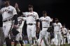 San Francisco Giants celebrate a 7-2 victory over the Chicago Cubs in a baseball game Thursday, June 3, 2021, in San Francisco. (AP Photo/D. Ross Cameron)