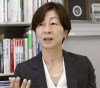 Japan's Kaori Yamaguchi, an executive member of the Japanese Olympic Committee, speaks during an interview in Tokyo, on May 19, 2021. Yamaguchi, one of Japan's best-known Olympians and an executive member of the Japanese Olympic Committee says Tokyo has been “cornered” into holding the games in seven weeks in the middle of a pandemic. In an outspoken editorial published Friday, June 4, by Japan's Kyodo news agency, Yamaguchi said the International Olympic Committee, the Japanese government, and local organizers, are ignoring widespread opposition — 50-80% depending on the poll — to the Olympics from the Japanese public. (Kyodo News via AP)