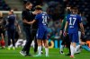 Chelsea's head coach Thomas Tuchel, left, celebrates with Chelsea's Reece James end of the Champions League final soccer match between Manchester City and Chelsea at the Dragao Stadium in Porto, Portugal, Saturday, May 29, 2021. (AP Photo/Manu Fernandez, Pool)