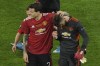 Manchester United's goalkeeper David de Gea, right, its consoled by Victor Lindelof after de Gea missed a penalty giving victory to Villarreal during the Europa League final soccer match between Manchester United and Villarreal in Gdansk, Poland, Wednesday May 26, 2021. (Aleksandra Szmigiel, Pool via AP)