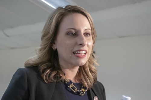 FILE - In this April 3, 2019, file photo, then- Rep. Katie Hill, D-Calif., is seen on Capitol Hill in Washington. The former California congresswoman has been ordered to pay about $220,000 in attorneys' fees to a British tabloid and two conservative journalists she sued after the publication of intimate photos without her consent. (AP Photo/J. Scott Applewhite, File)