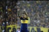 FILE - In this Oct. 22, 2019 file photo, Carlos Tevez of Boca Juniors, waves prior to the Copa Libertadores semifinal second leg soccer match against River Plate, at La Bombonera stadium in Buenos Aires, Argentina. Tevez in a press conference on Friday, June 4, 2021 announced his departure from the team. (AP Photo/Natacha Pisarenko, File)