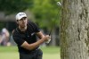Patrick Cantlay watches his shot to the 13th green during the second round of the Memorial golf tournament, Friday, June 4, 2021, in Dublin, Ohio. (AP Photo/Darron Cummings)