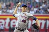 New York Mets pitcher Jacob deGrom throws against the Arizona Diamondbacks in the first inning during a baseball game, Monday, May 31, 2021, in Phoenix. (AP Photo/Rick Scuteri)