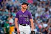 Colorado Rockies starting pitcher Jon Gray reacts after giving up a solo home run to Oakland Athletics' Mark Canha in the third inning of a baseball game Friday, June 4, 2021, in Denver. (AP Photo/David Zalubowski)