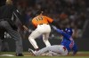 Chicago Cubs' Sergio Alcántara (51) slides safely into third base with a triple as San Francisco Giants third baseman Evan Longoria (10) awaits the late relay during the sixth inning of a baseball game Friday, June 4, 2021, in San Francisco. The umpire is CB Bucknor. (AP Photo/D. Ross Cameron)