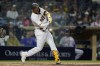 San Diego Padres' Webster Rivas hits a single during the third inning of the team's baseball game against the New York Mets, Friday, June 4, 2021, in San Diego. (AP Photo/Gregory Bull)