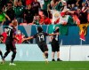 Mexico's Diego Lainez (14) celebrates a goal against the United States during the second half of a CONCACAF Nations League championship soccer match, Sunday, June 6, 2021, in Denver. (AP Photo/Jack Dempsey)