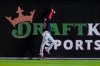 Washington Nationals right fielder Juan Soto cannot reach a double by Philadelphia Phillies' Rhys Hoskins during the ninth inning of a baseball game, Friday, June 4, 2021, in Philadelphia. (AP Photo/Matt Slocum)