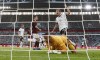Germany's Thomas Mueller celebrates after scoring his side's third goal against Latvia'a keeper Roberts Ozols during the international friendly soccer match between Germany and Latvia in Duesseldorf, Germany, Monday, June 7, 2021 (AP Photo/Martin Meissner)