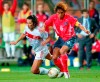 FILE - In this June 29, 2002, file photo, South Korea's Yoo Sang-chul, right, competes for the ball with Turkey's Ilhan Mansiz during the 2002 World Cup third place playoff soccer match between South Korea and Turkey, at the Daegu World Cup stadium, in Daegu, South Korea. Yoo, one of the stars of South Korea's surprising run to the semifinals at the 2002 World Cup, has died after long battle with pancreatic cancer. He was 49. (AP Photo/Tony Gutierrez,File)